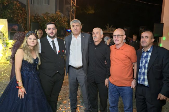 GENÇ ÇİFTİMİZE BİR ÖMÜR BOYU MUTLULUKLAR DİLERİZ...